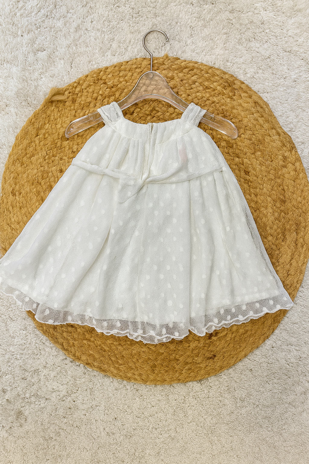 White polka net frock with red flower