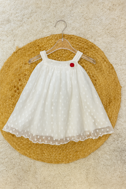 White polka net frock with red flower