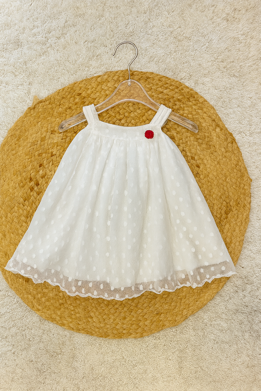White polka net frock with red flower