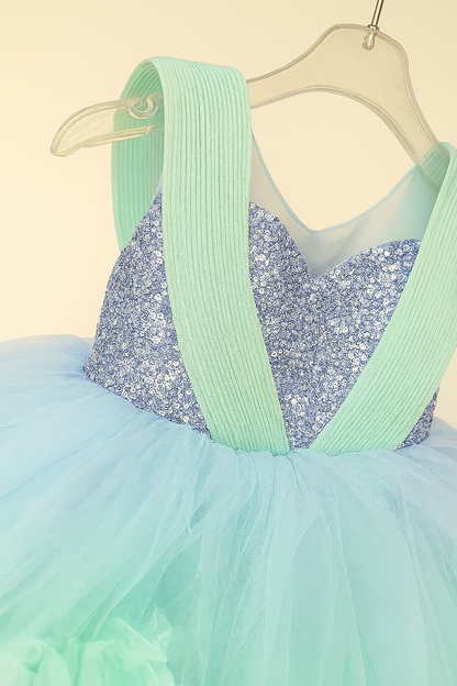 Glittery party frocks with dramatic ruffle layers