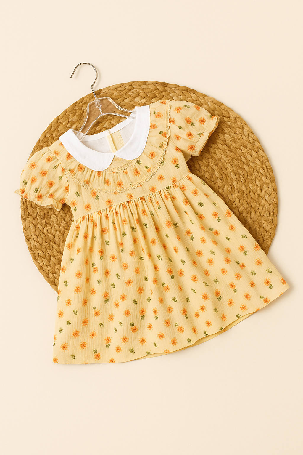 Muslin Charming Yellow Floral Frock with White Peter Pan Collar