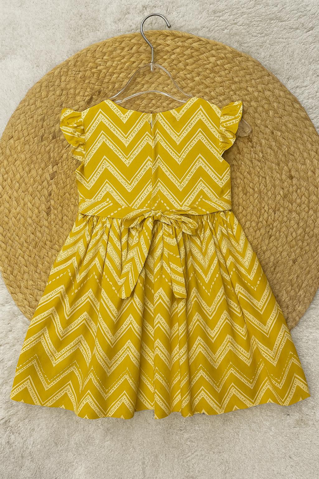 Yellow zigzag frock with cute bow detail