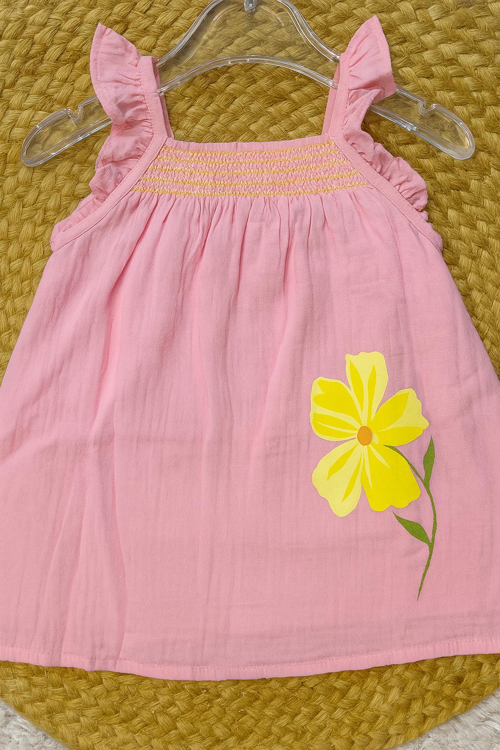 Cotton sleeveless frocks with smocking and flower print