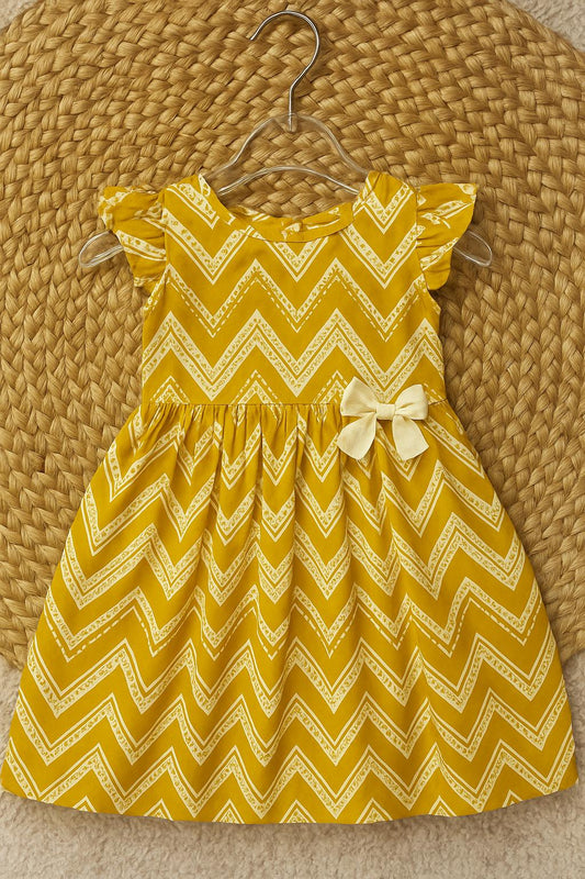 Yellow zigzag frock with cute bow detail