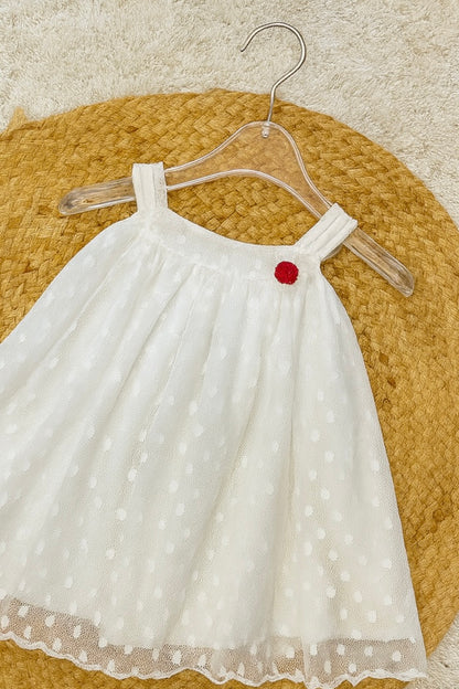 White polka net frock with red flower