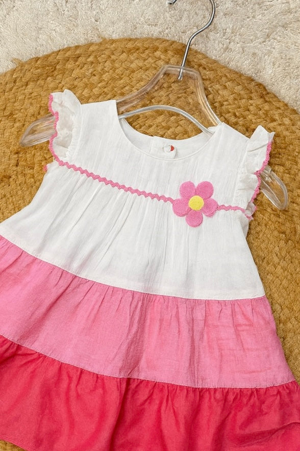 Three-tone pink frock with floral patch